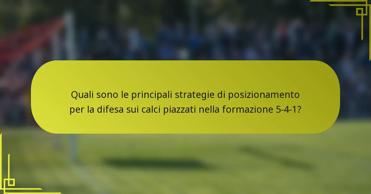 Quali sono le principali strategie di posizionamento per la difesa sui calci piazzati nella formazione 5-4-1?